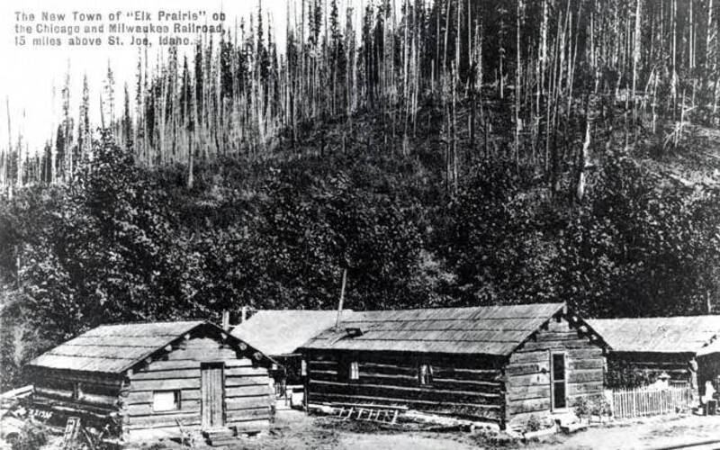 Caption on photo 'The new town of 'Elk Prairie' on the Chicago and Milwaukee Railroad, 15 miles above St. Joe, Idaho.'