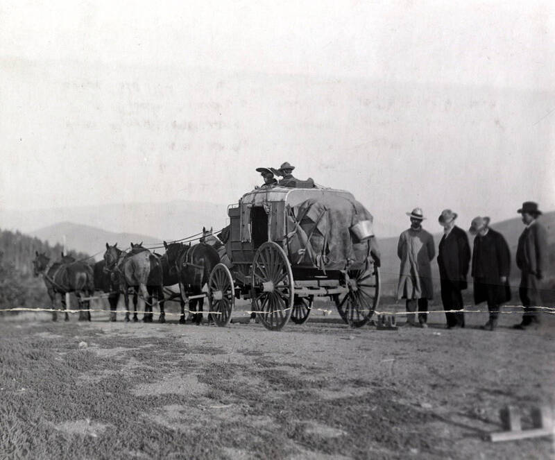 Men looking at ground: Lewis W. Shurtliff and Frank Cannon