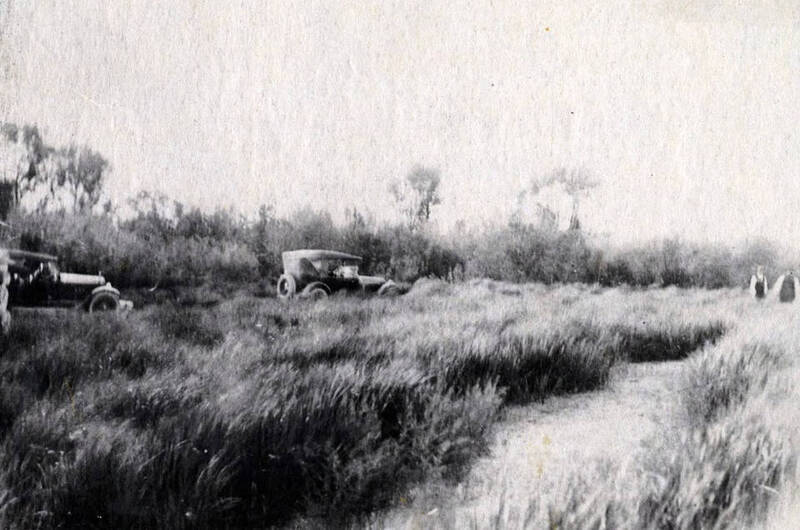 Bare streak to right shows ruins of east wall of old fort. Grove to left is where Jason Lee preached first sermon west of the Rocky Mtns.