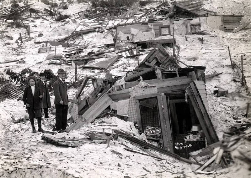 Home of Mr. G. Gibson demolished by snowslide. Mace, Idaho.