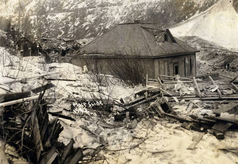 Homes demolished by snowslide. Mace, Idaho.