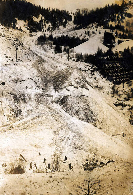Men digging out after the snowslide. Mace, Idaho.