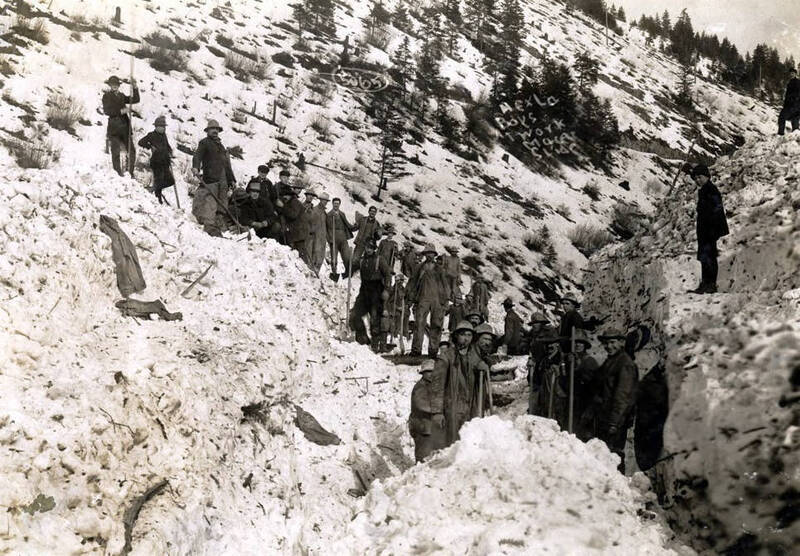 Hexla boys digging out after the snowslide. Mace, Idaho.