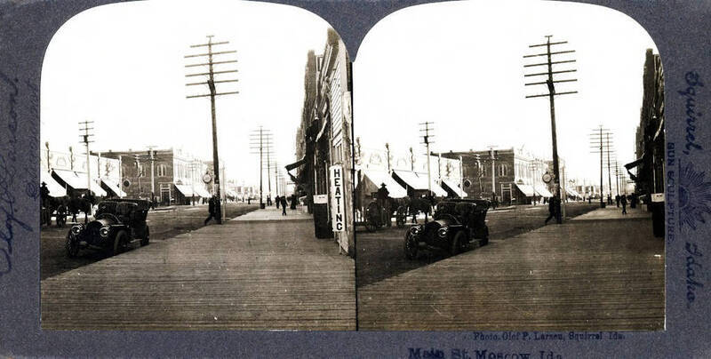 Visible: Wallace's Jewelry, David's. First automobile in town?