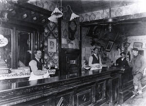 Owned by Matt Geary. First man is Kid Smith; farthest (behind bar)is Matt Geary