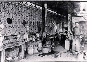 Jonathan Lamb working in the blacksmith shop
