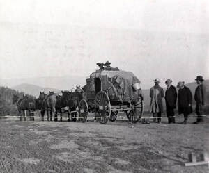 Men looking at ground: Lewis W. Shurtliff and Frank Cannon