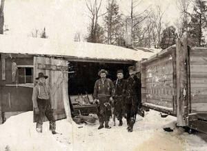 Box filled with water in day and poured on roads at night to freeze so horses could pull sleds easier