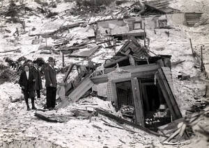 Home of Mr. G. Gibson demolished by snowslide. Mace, Idaho.