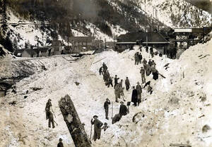 Men digging out after the snowslide. Mace, Idaho.
