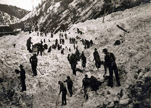Men digging out after the snowslide. Mace, Idaho.