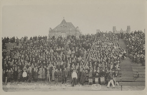 Postcard of the spectators at a football game between the University of Idaho and Washington State College.