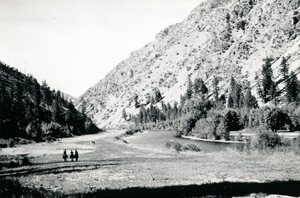Landing strip and three men on horseback at the Jess Taylor Ranch on Big Creek