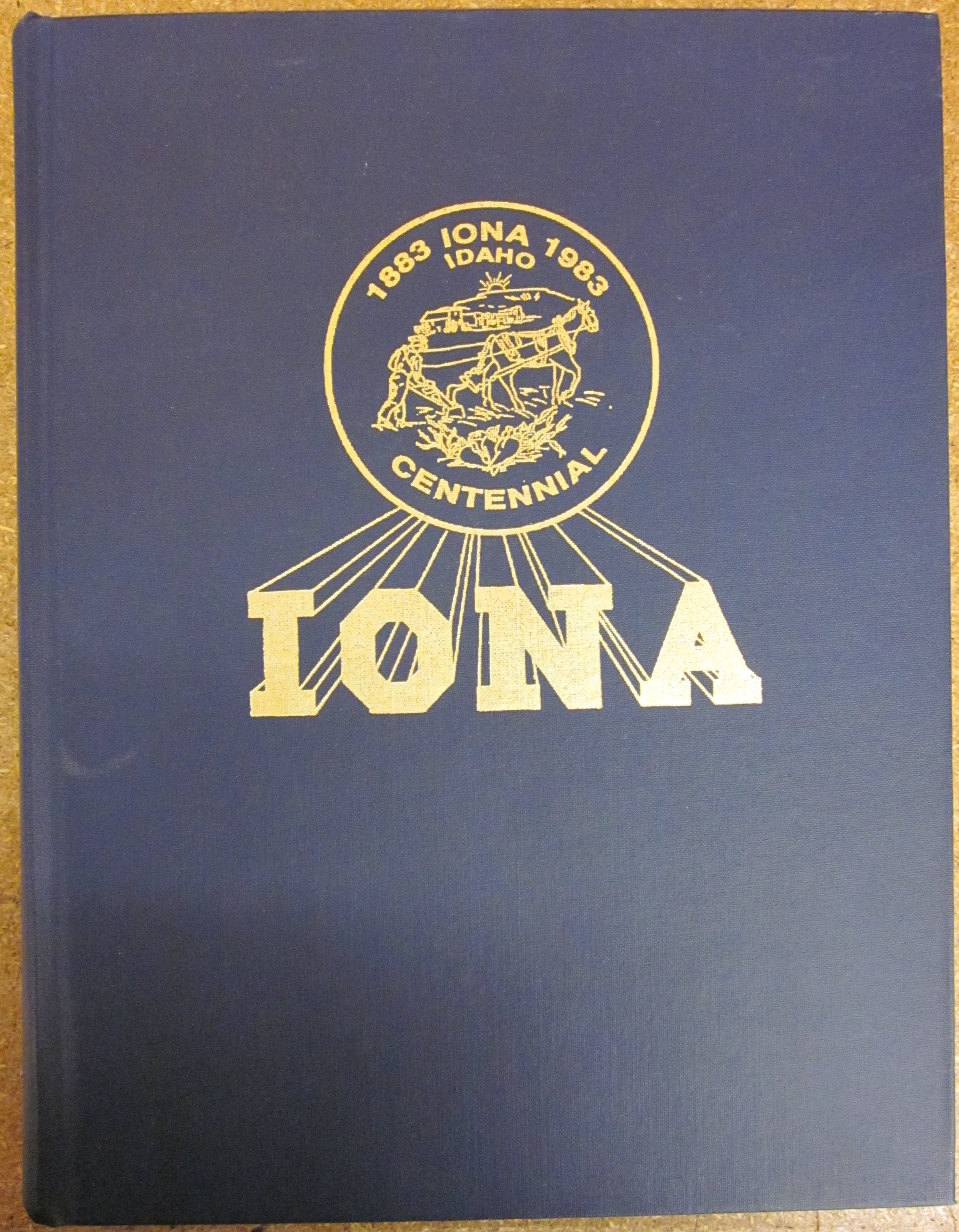 Iona centennial history book, 1883-1983: A centennial history book, containing historical material and personal histories, su ; bmitted by the residents and previous residents of Iona, Bonneville County, Idaho (book cover)
