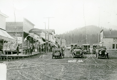 Main Street of Deary with cars full of people