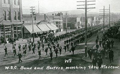 W.S.C Band and Rooters Marching on Main Street
