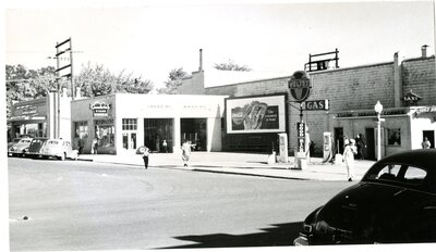 Gas station at corner of 5th and Main Streets