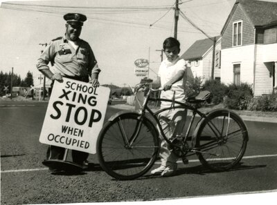 Police Officer and Child at School Crossing
