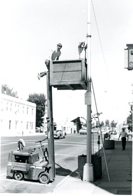 City Workers Decorating Main Street