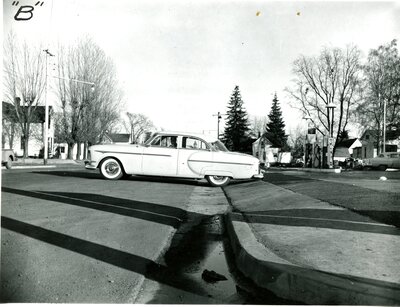 Car Leaving Texaco Station