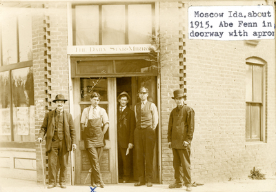 Postcard of five men in front of The Daily Star-Mirror, Moscow, Idaho