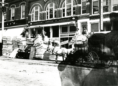 Wagonload of mattresses arriving at Grice Furniture Store