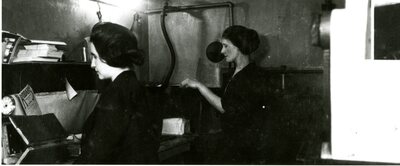 Hodgins Drug Store interior with employees