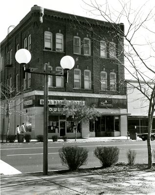 Shields Building, housing Owl Drug, Ward Paint and Hardware, and Eggan Apartments