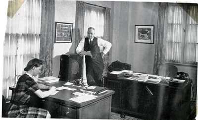 Frank B. Robinson in his office
