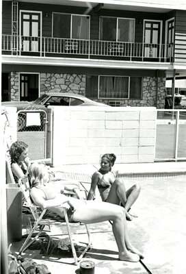 Lounging by the Royal Motor Inn swimming pool
