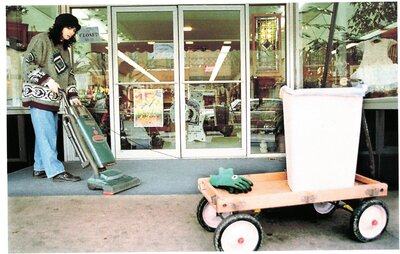 Cleaning in front of Wild Women Traders store