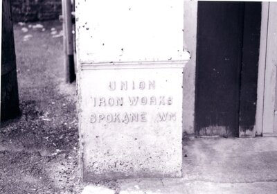 Pillar base with sign "Union Iron Works, Spokane, WA"