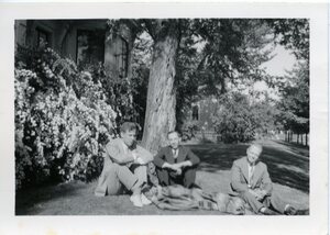 Men on McConnell Mansion lawn