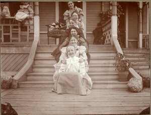 Girls on steps of Shield's home