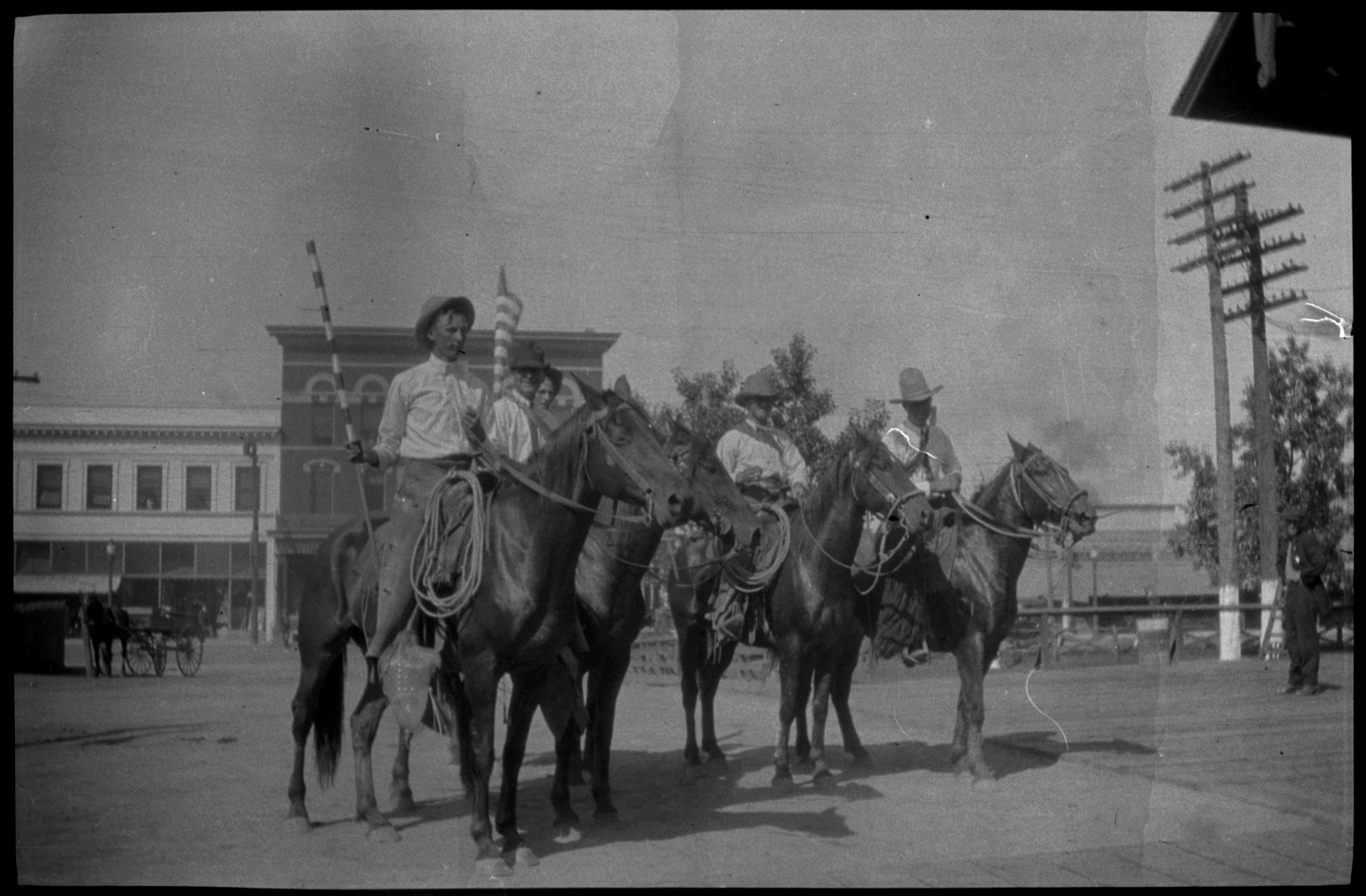 Four people on horses | George W. Tabor Photographs