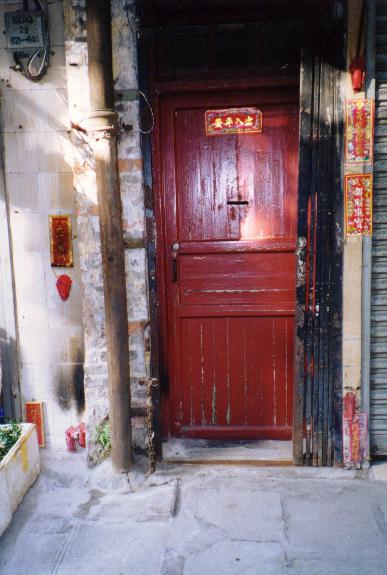 Doorway with burn marks, Guangzhou